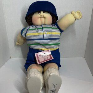 1984 Soft face Cabbage Patch Doll - Brown curly hair with baseball hat